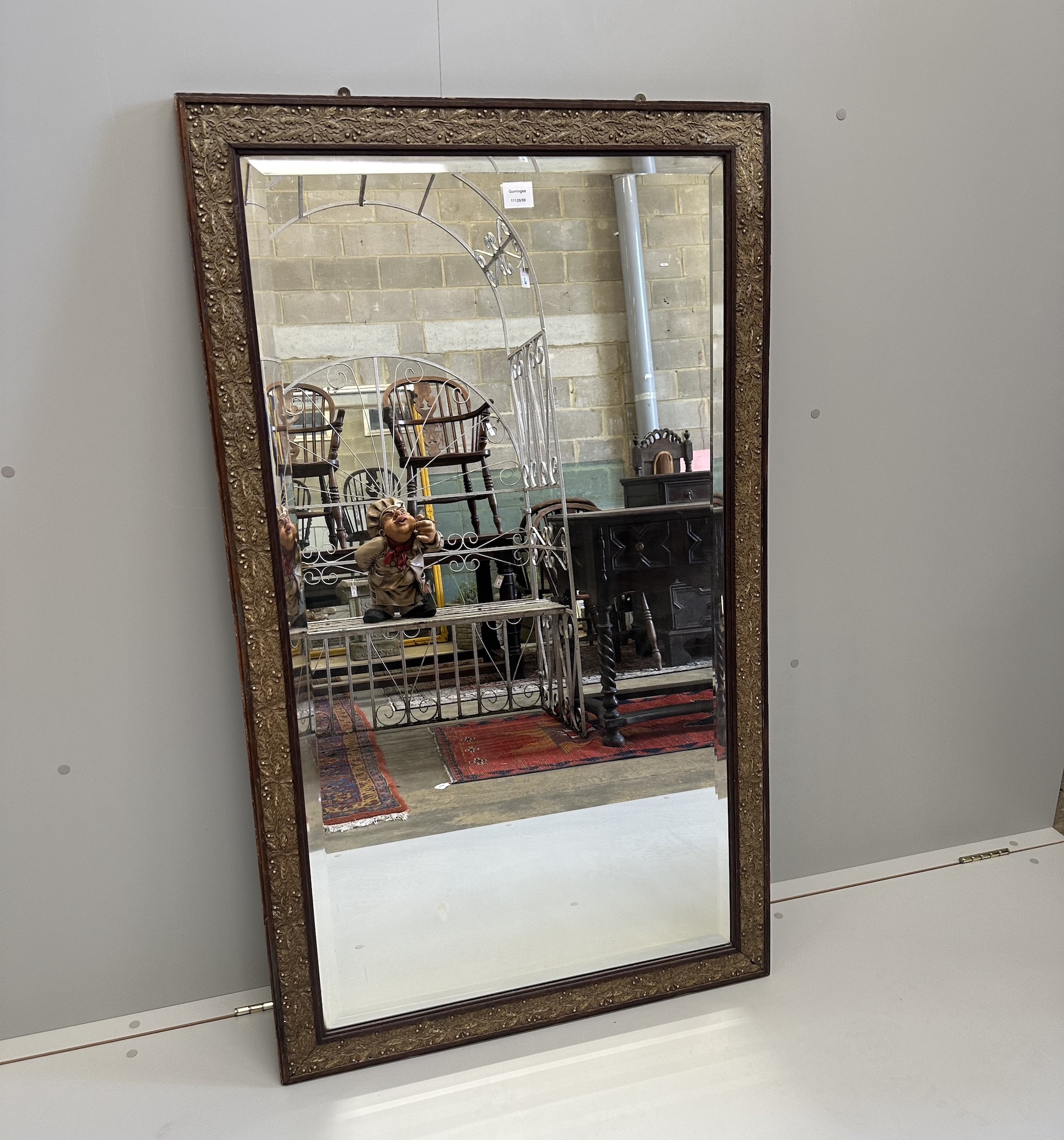 A Victorian style bevelled glass rectangular wall mirror with a moulded gesso oak leaf and acorn border, width 79cm, height 135cm